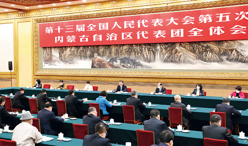 习近平：新时代党和人民奋进的必由之路